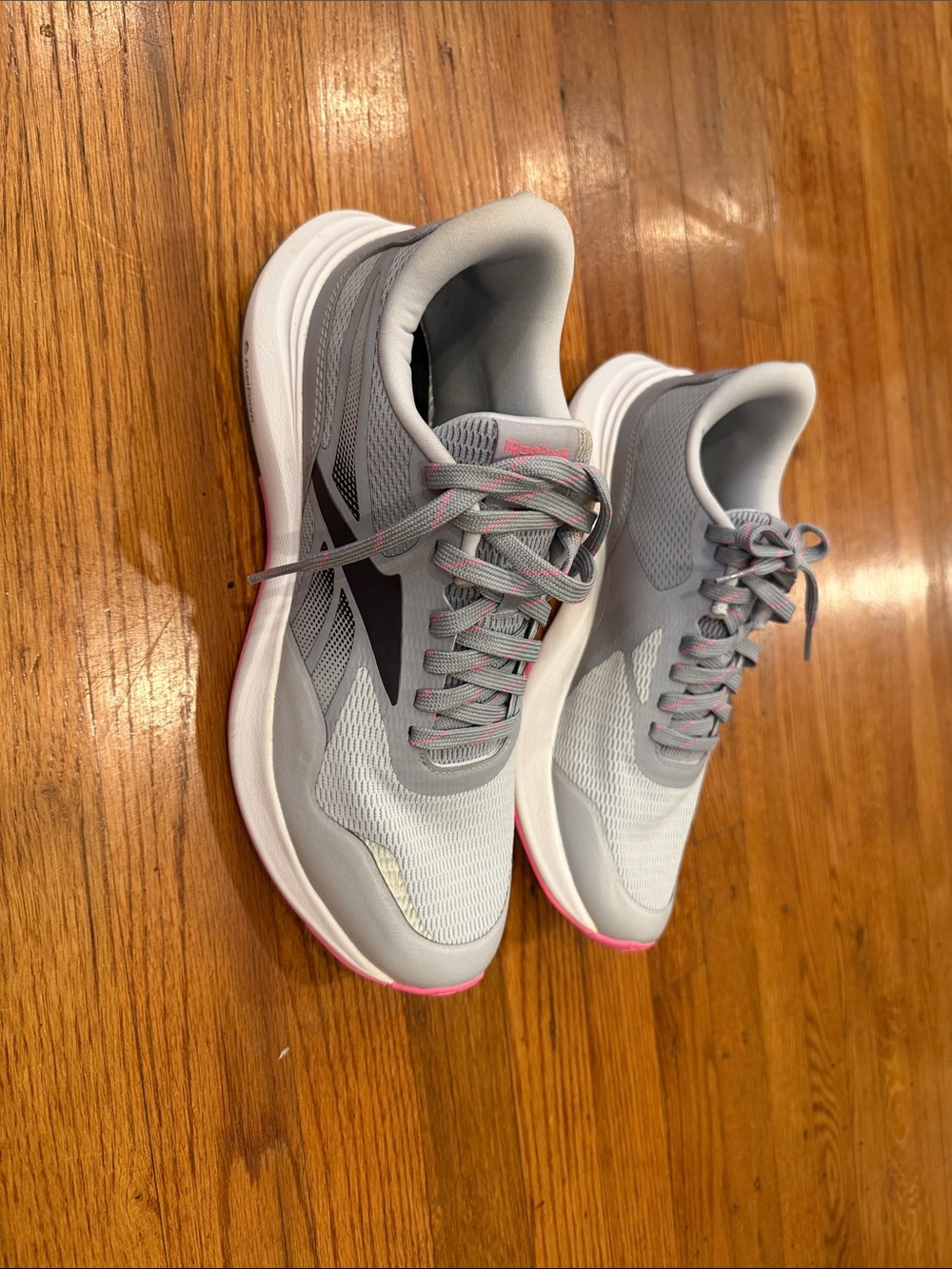 Size10 light Gray Women's Running Sneakers with Pink Accents made Indonesia use